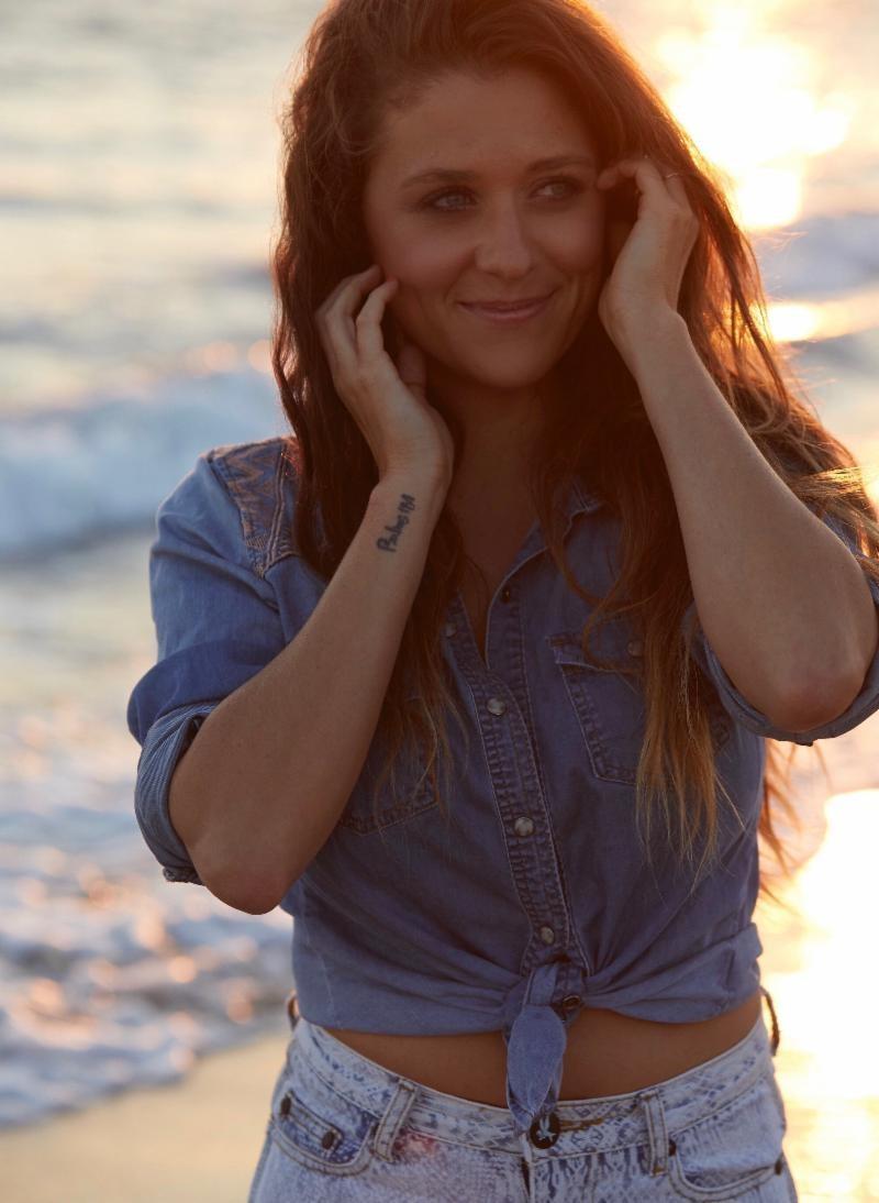 Girl standing outside at beach